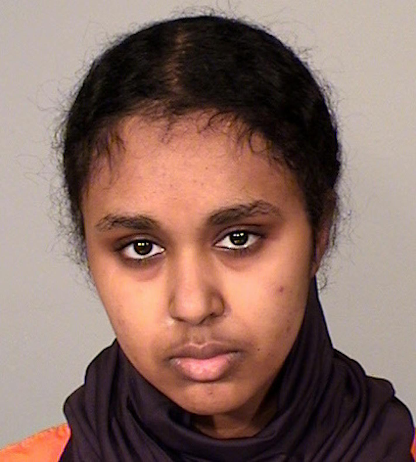 This photo provided by the Ramsey County Sheriff's Office shows Tnuza Jamal Hassan. A criminal complaint said Hassan, 19, a former student at St. Catherine University in St. Paul, admitted to investigators that she started the fires on Wednesday, Jan. 17, 2018, including one in a dormitory that housed a day care center. She's charged with first-degree arson. (Ramsey County Sheriff's Office via AP)