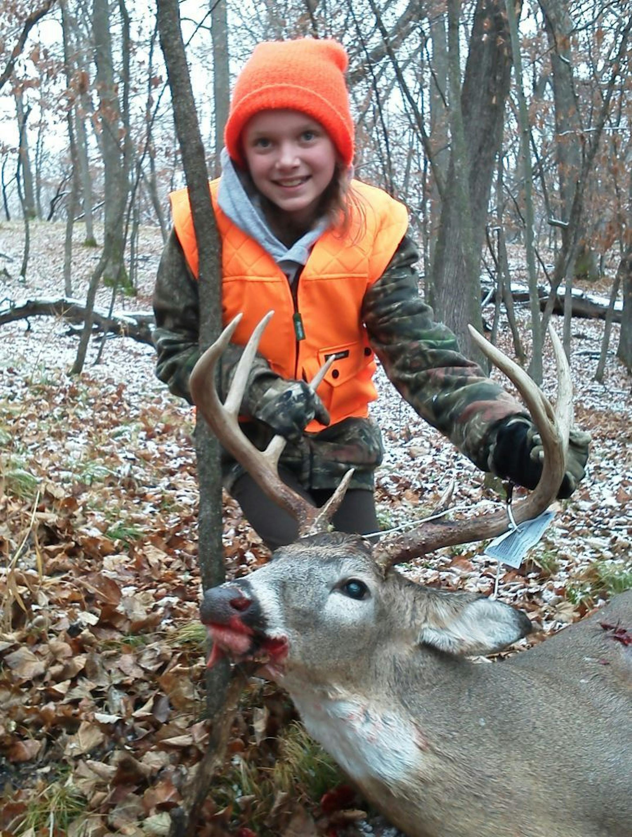 Kaitlyn Alberg, 11, of South Haven, shot this 8 pointer in the South Haven area the morning of the opener.