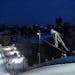 A skier made a jump during the International Ski Jumping Competition 2020 in Bloomington.