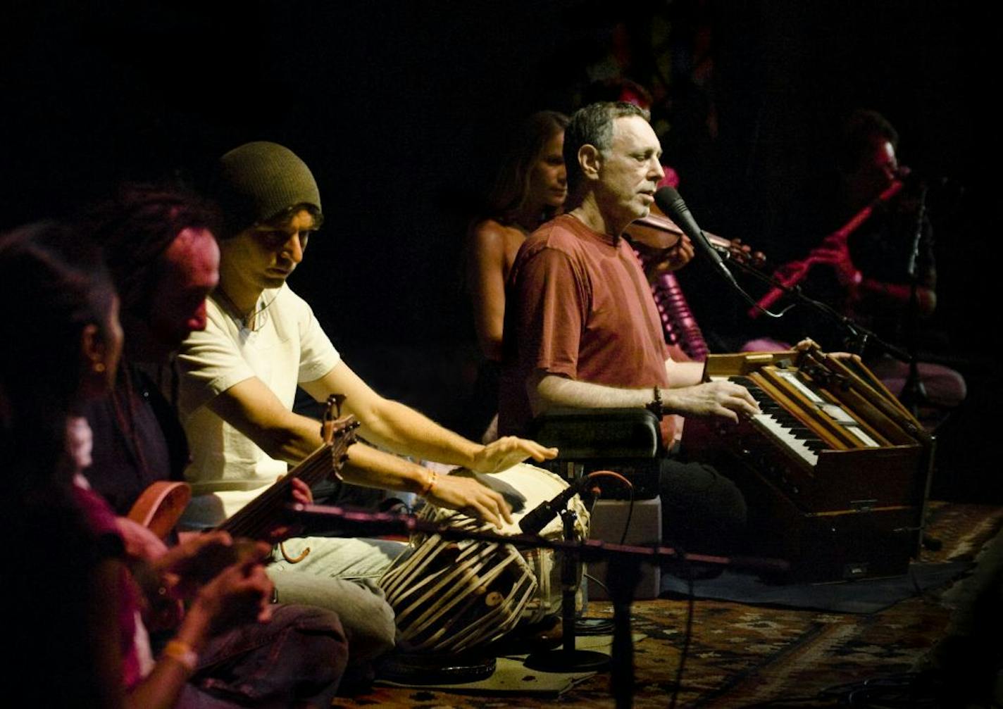 Krishna Das performing in ONE TRACK HEART: THE STORY OF KRISHNA DAS, a film by Jeremy Frindel. A Zeitgeist Films release. Photo: Kailas