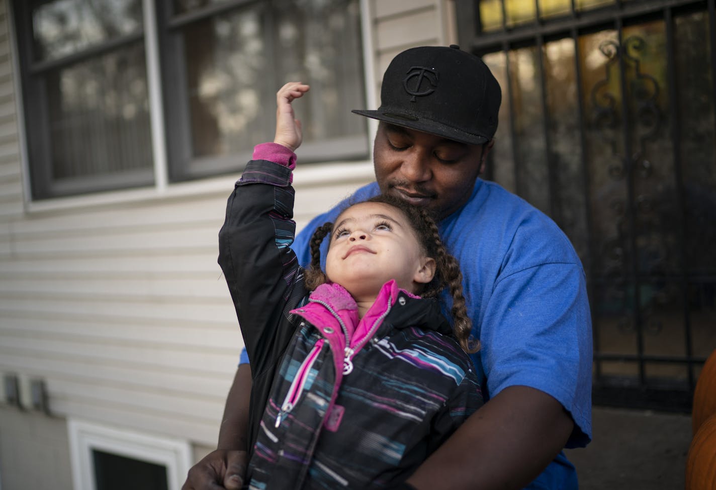 Jamokia Curry worked at Water Gremlin for two years and left this August. His daughter Ja'Naea, pictured, has tested high for lead. They are photographed together outside their home in St. Paul, Minn., on Tuesday, October 29, 2019. ] RENEE JONES SCHNEIDER &#x2022; renee.jones@startribune.com