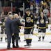 Pacific Division forward John Scott, center, is named most valuable player after the NHL hockey All-Star championship game Sunday, Jan. 31, 2016, in N