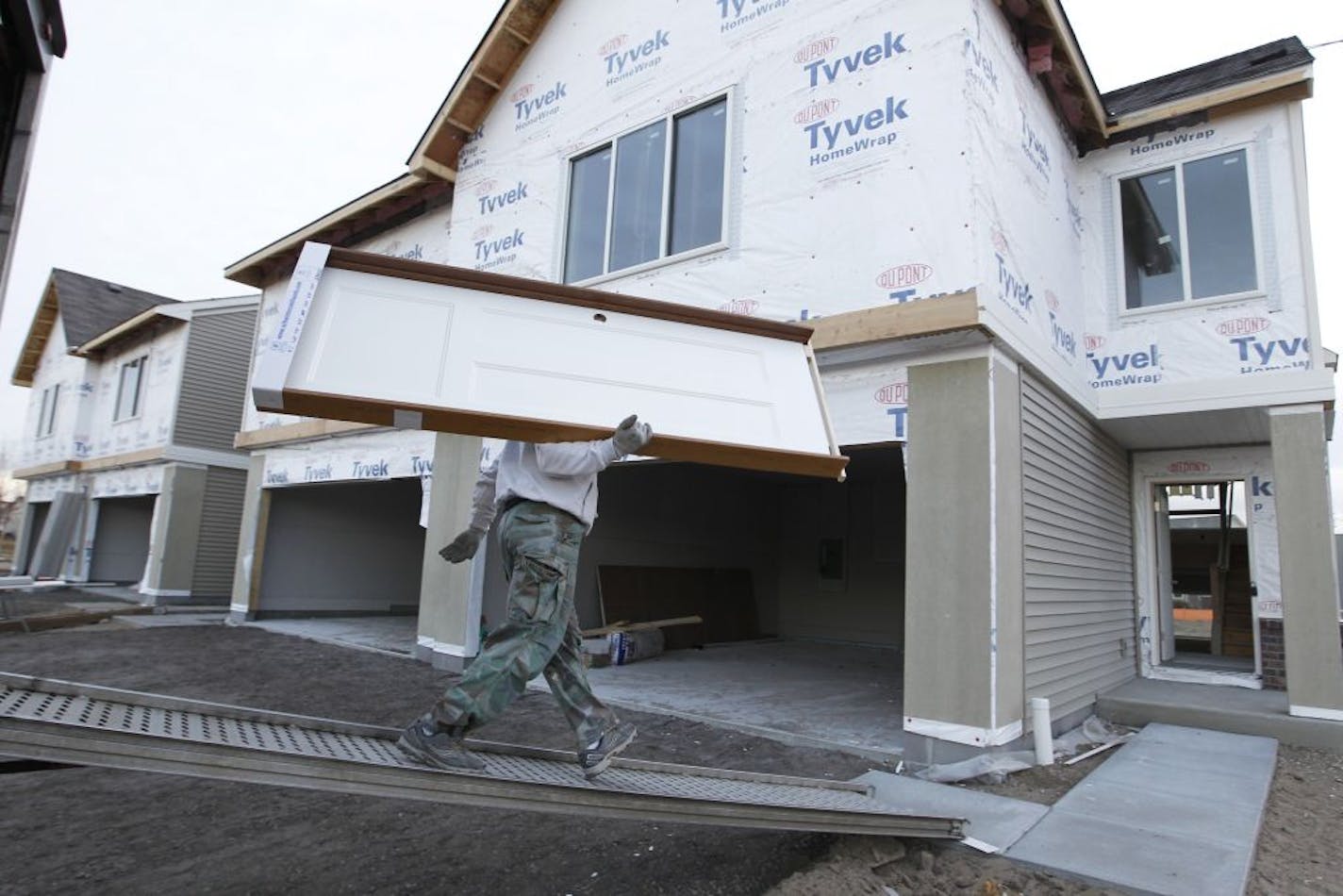 Rottlund will finish projects such as these Blaine townhouses and pay off subcontractors. "No one will get stiffed," said Steven Kahn.