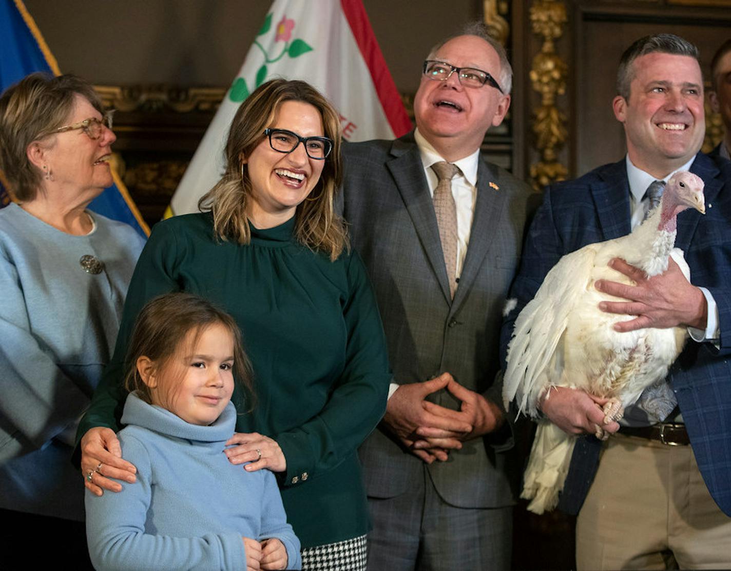 In simpler times last year : Lt. Gov. Peggy Flanagan, daughter Siobhan, Gov. Tim Walz, Minnesota Turkey Growers Association President Paul Kvistad.