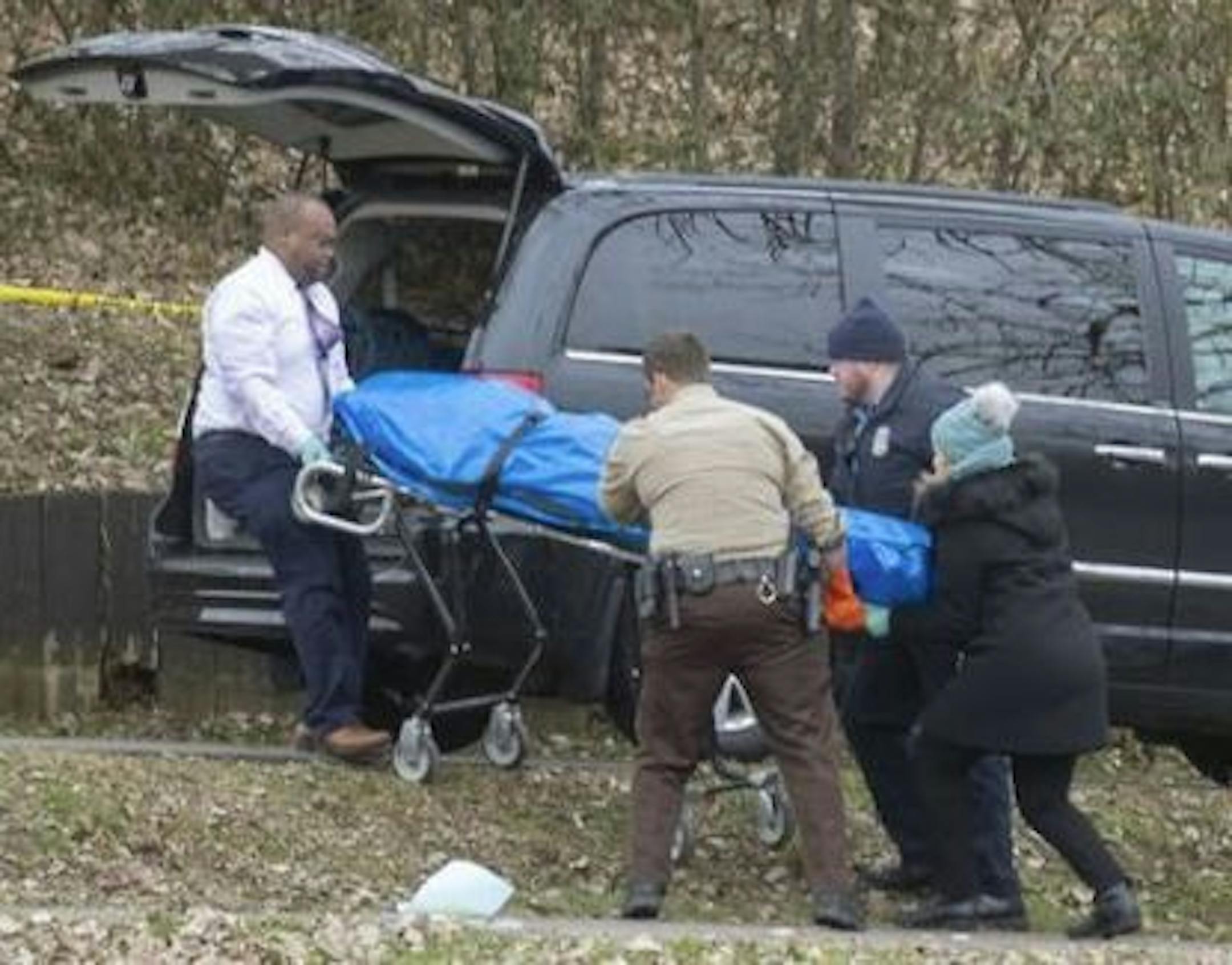 Emergency personnel recovered a body on Nov. 26 from a Chain of Lakes channel. Credit: Elizabeth Flores/Star Tribune