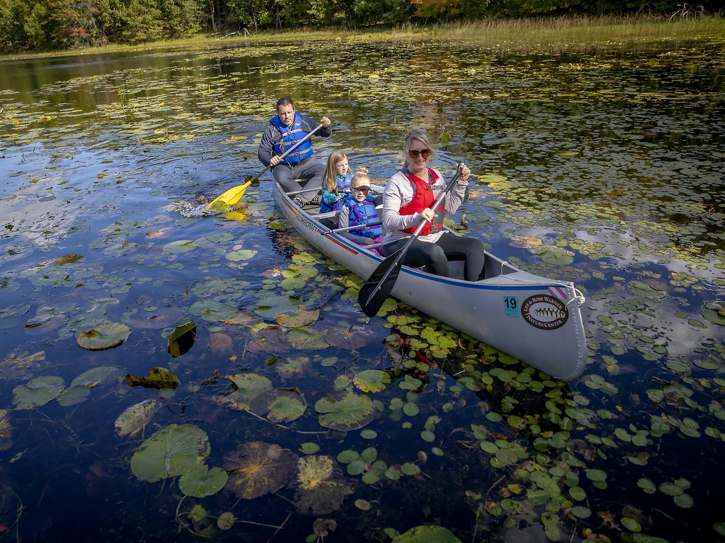 Dan and Brooke Triplett and daughters Macyn, 10, left, and Madelyn, 7, enjoyed the fall colors Sunday, Oct. 6, at the Warner Nature Center near Marine on St. Croix.