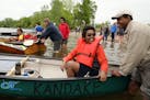 Faris Elhassan, 12, and his dad Khalid of Maple Grove readied their boat for the endurance competition.