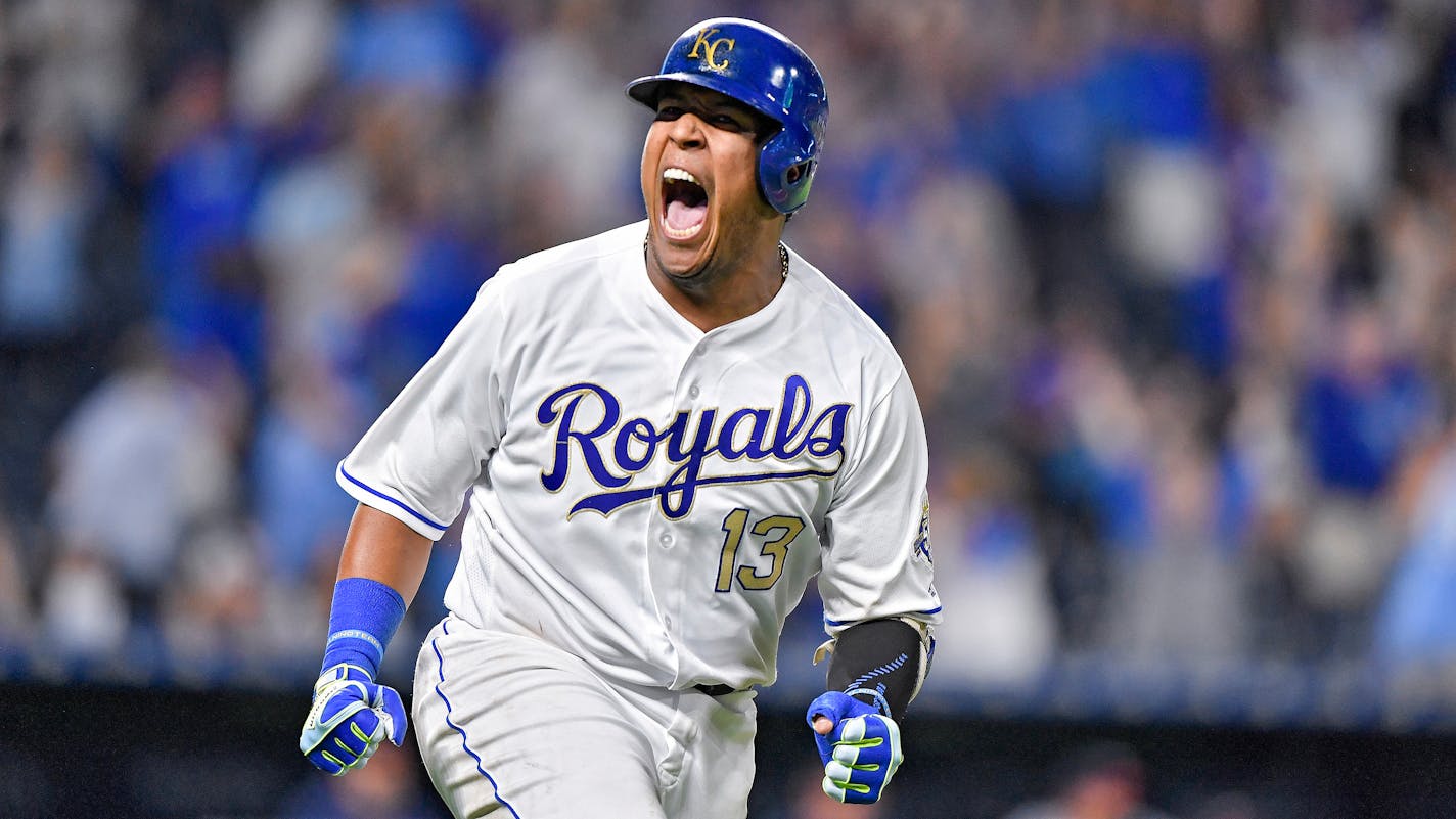 Salvador Perez celebrates his walk off grand slam for an 8-4 win against the Twins on Friday