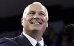 FILE - In this June 20, 2018 file photo, Pete Stauber, the Republican candidate running for Minnesota's 8th District seat, speaks at a rally Duluth. S