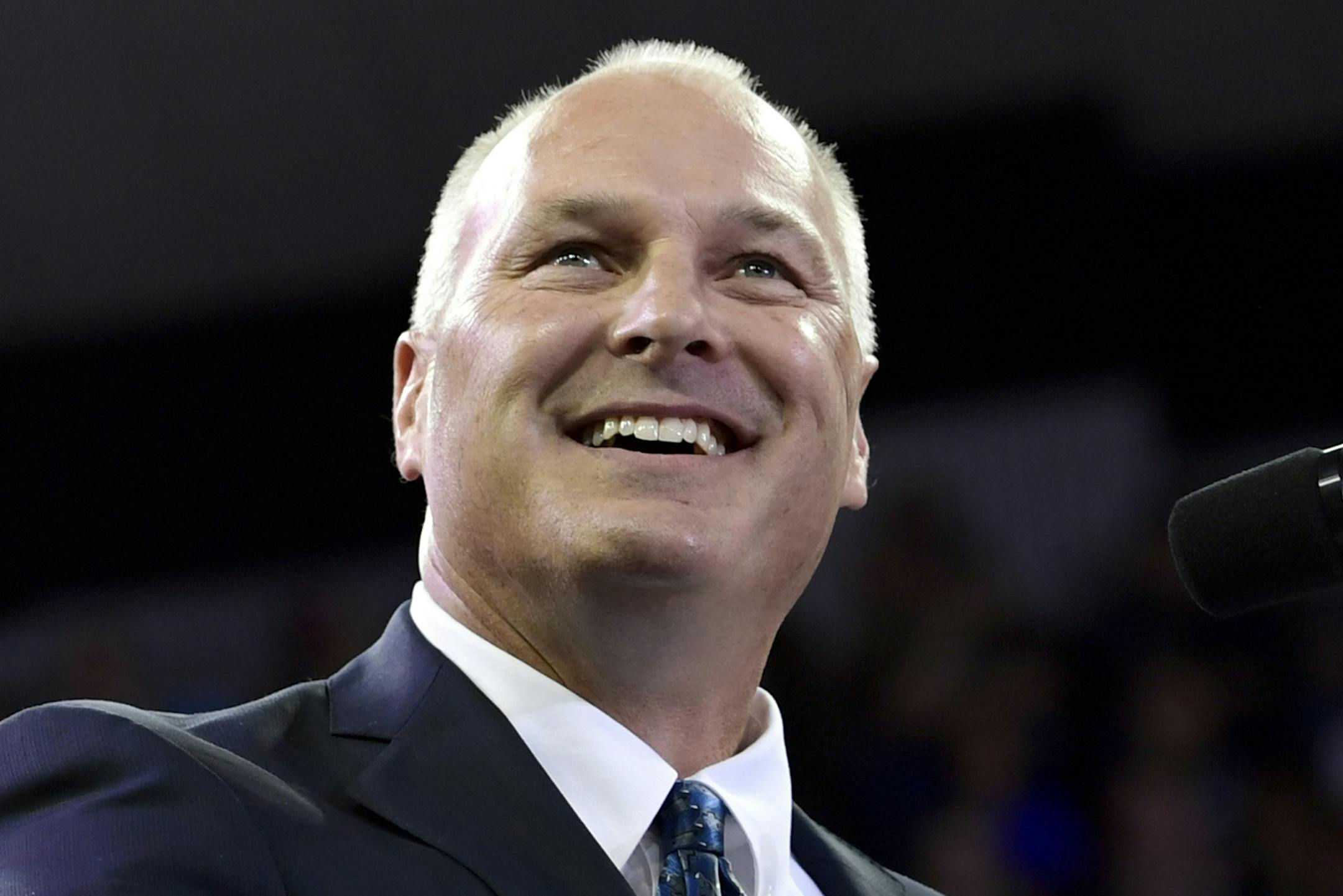 FILE - In this June 20, 2018 file photo, Pete Stauber, the Republican candidate running for Minnesota's 8th District seat, speaks at a rally Duluth. Stauber faces Democrat Joe Radinovich in the Nov. 6 election. (AP Photo/Susan Walsh, File)