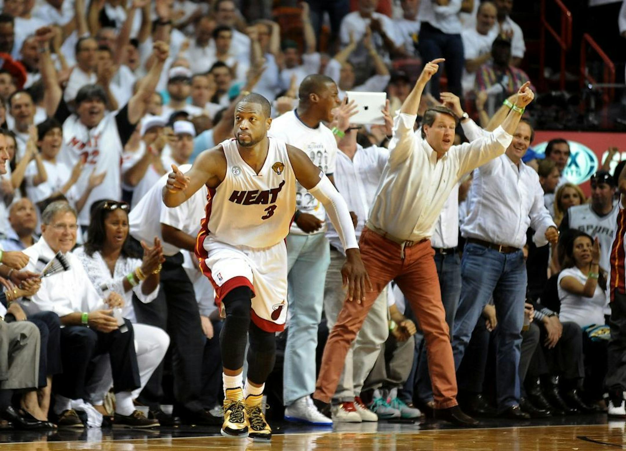 Dwyane Wade celebrates hitting an off-balance shot during the first half of Game 7 of the NBA Finals