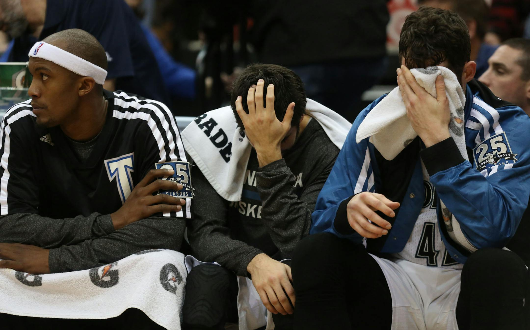 Wolves Dante Cunningham, Ricky Rubio and Kevin Love reacted after a missed basket by the Wolves during the second half at the Target Center in Minneapolis Wednesday, January 15, 2014. Wolves lose to the Kings 111-108 ] (KYNDELL HARKNESS/STAR TRIBUNE) kyndell.harkness@startribune.com