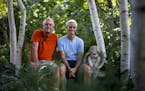 Tom Hayden and Jay Peterson have spent almost 30 years creating their Beautiful Gardens winner in Minnetonka. They posed for a photo on a stone bench 