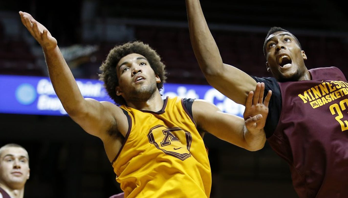 Reggie Lynch (left) fought for a rebound during a team scrimmage last season.