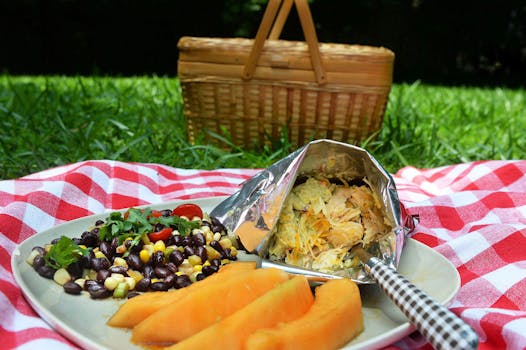 A stylish portable lunch is a breeze with Summer Black Bean Salad, marinated melon and a chicken taco built in a snack-size bag of tortilla chips.