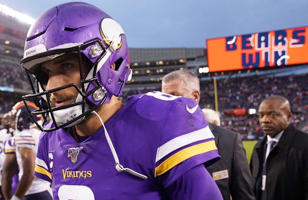 Vikings quarterback Kirk Cousins walked off the field after the loss to the Bears on Sunday at Soldier Field.