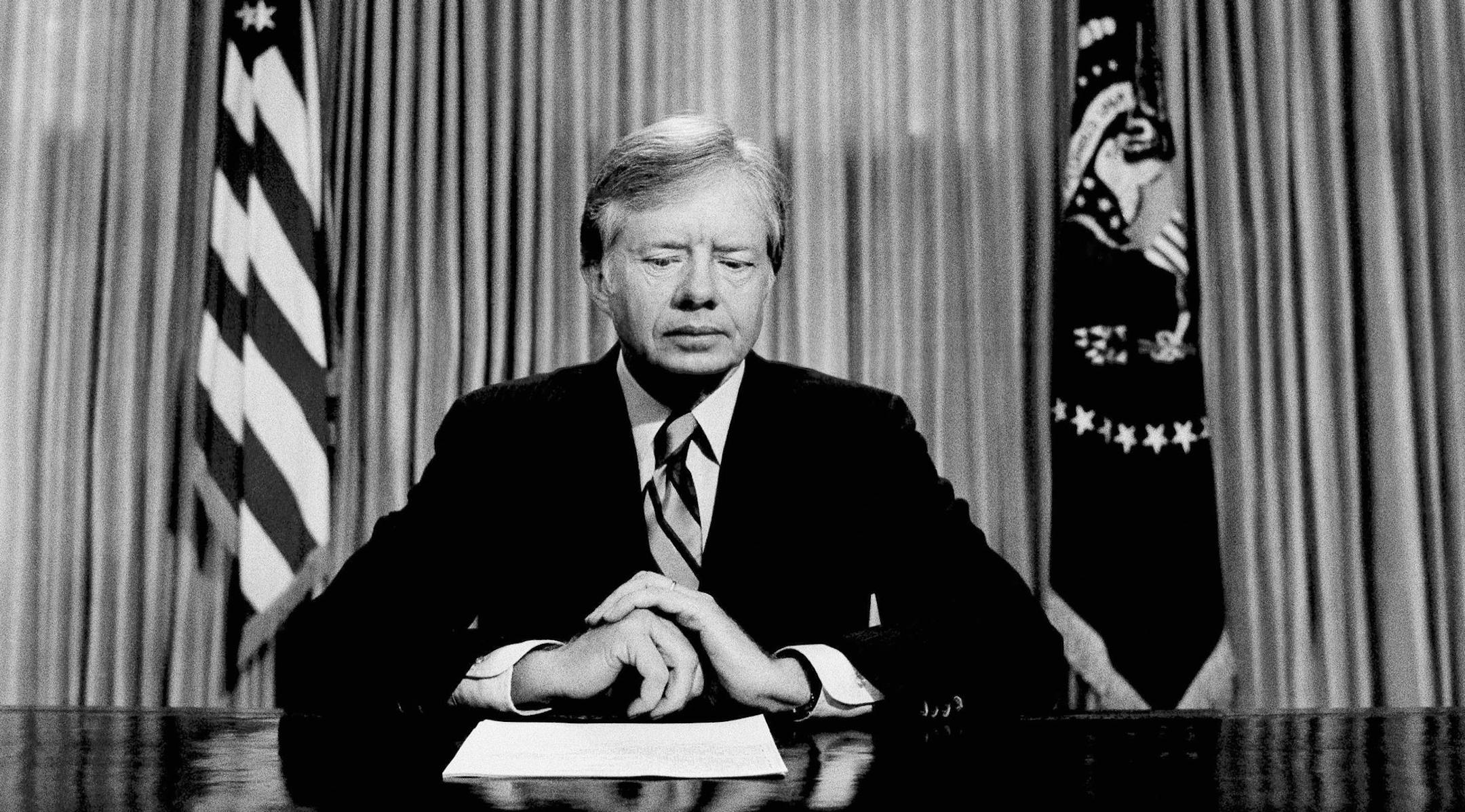 FILE - In this April 25, 1980 file photo, President Jimmy Carter prepares to make a national television address from the Oval Office at the White House in Washington, on the failed mission to rescue the Iran hostages. On Wednesday, Aug. 12, 2015, Carter announced he has cancer and will undergo treatment at an Atlanta hospital. (AP Photo)