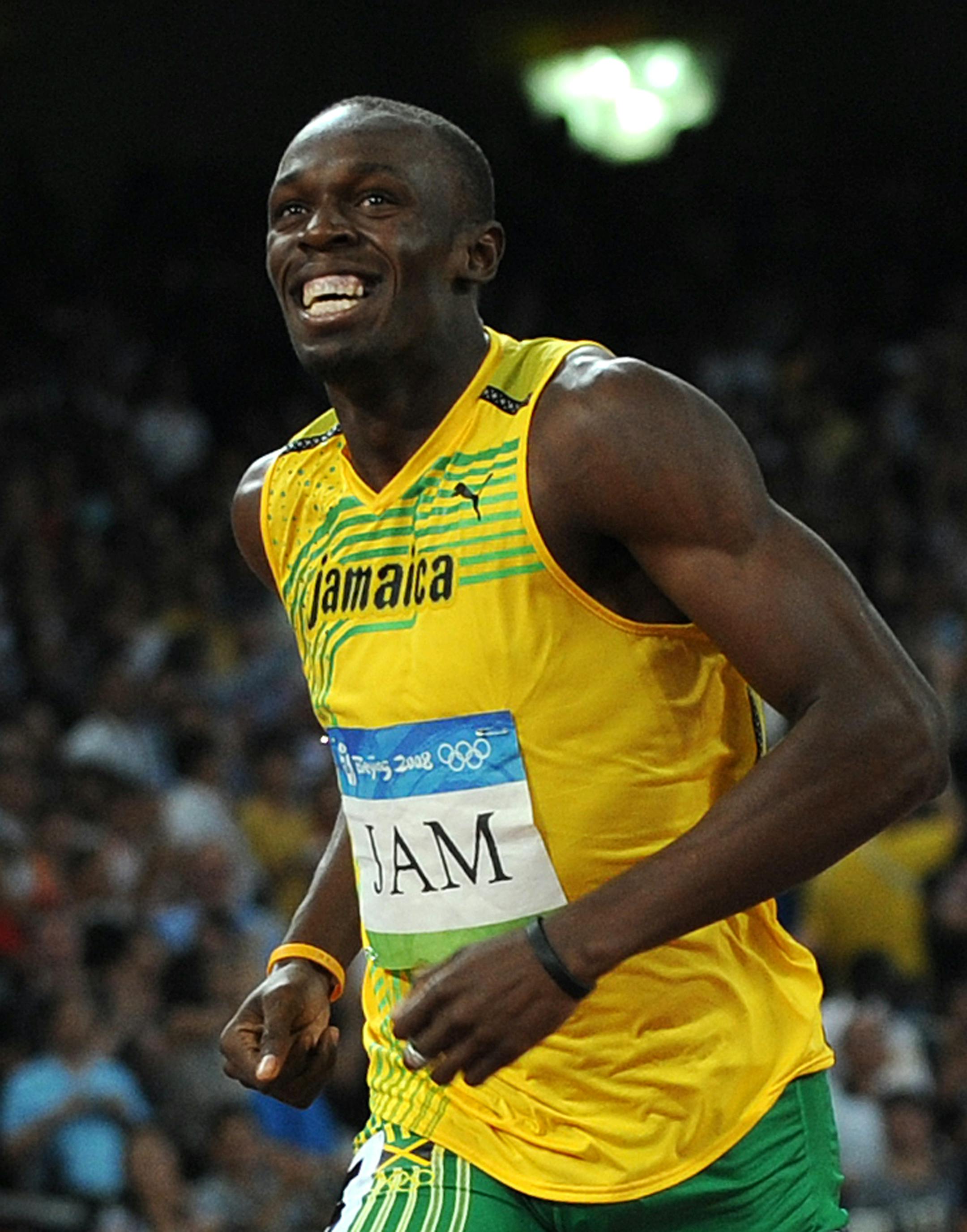 Jamaica's Usain Bolt celebrates after winning the men's 4x100m relay final.
