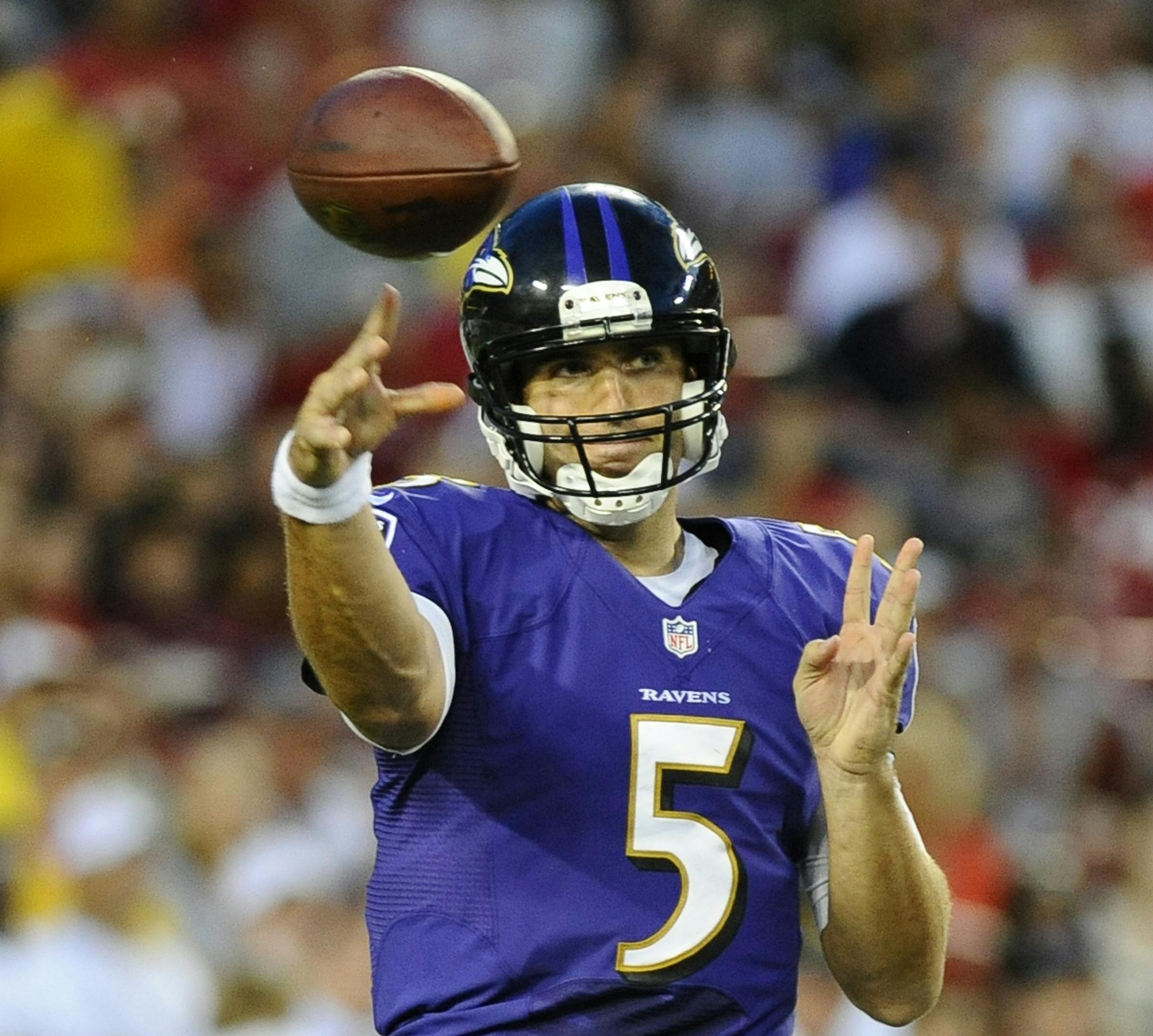 Baltimore Ravens quarterback Joe Flacco (5) throws a pass against the Tampa Bay Buccaneers during the first half of an NFL preseason football game Thursday, Aug. 8, 2013, in Tampa, Fla. (AP Photo/Brian Blanco)