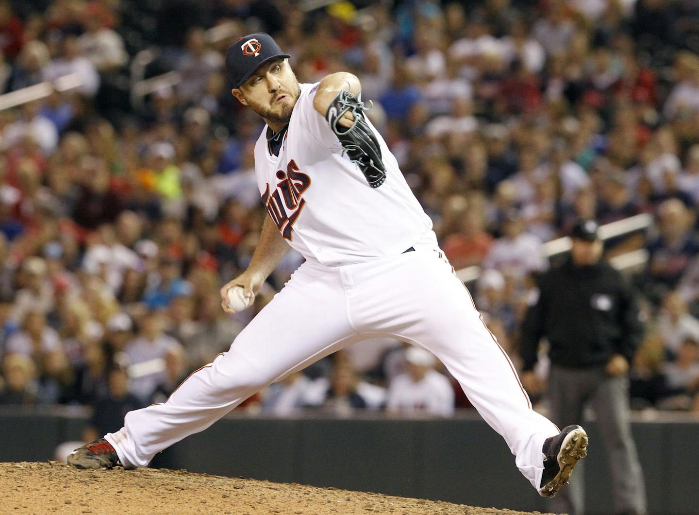 Minnesota Twins relief pitcher Kevin Jepsen delivers to the Houston Astros during the ninth inning of a baseball game in Minneapolis, Friday, Aug. 28, 2015. The Twins won 3-0. (AP Photo/Ann Heisenfelt)