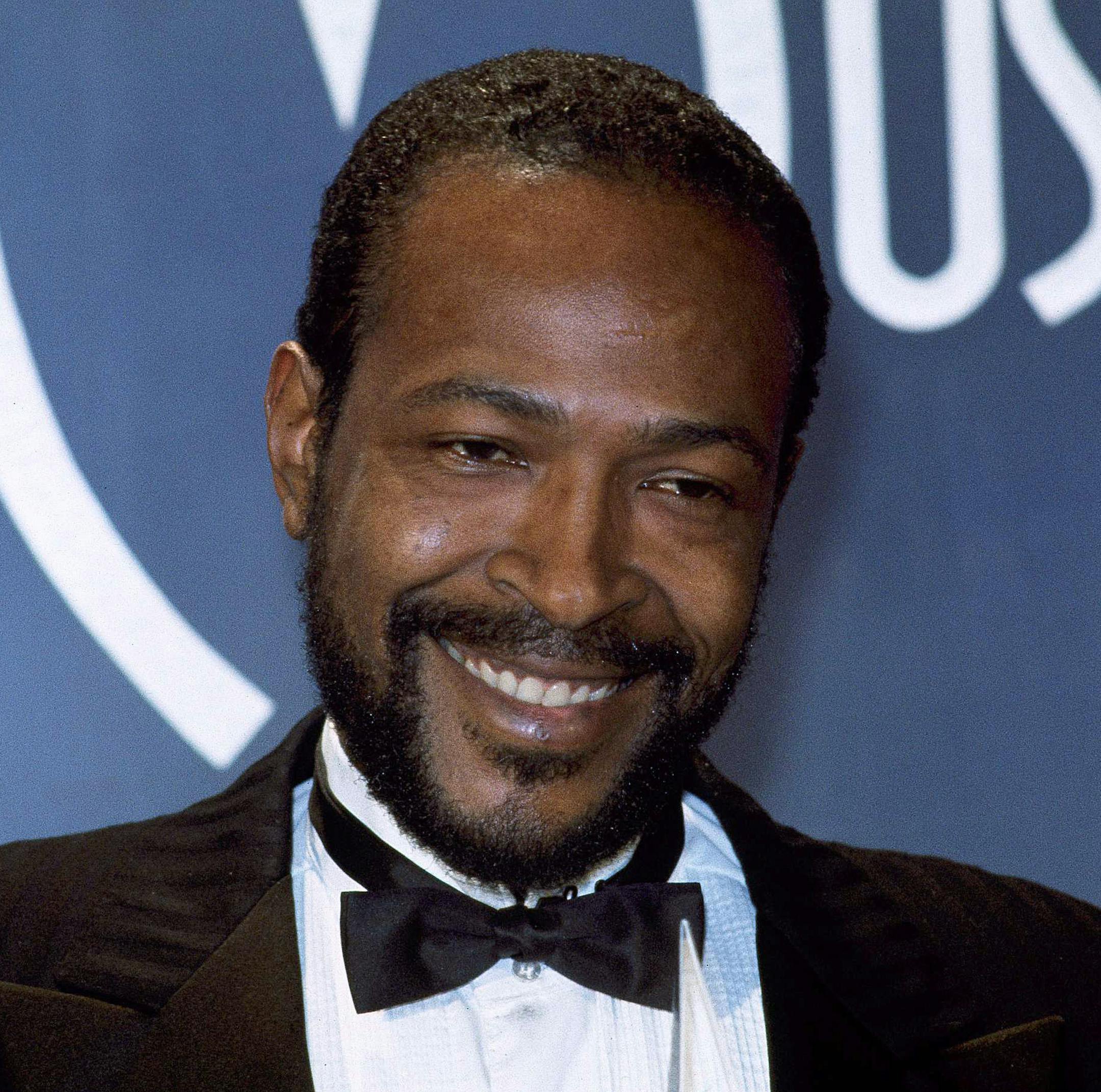FILE - In this Jan. 17, 1983 file photo, singer-songwriter Marvin Gaye, winner of Favorite Soul/R&B Single, "Sexual Healing," attends the American Music Awards in Los Angeles. On Wednesday, March 4, 2015, Grammy-winning singer Pharrell Williams told a jury in federal court in Los Angeles that he grew up listening to Gaye's music. But the singer-producer said he didn't try to copy it directly for his collaboration with Thicke and T.I. Williams is being sued by Gaye's children, who claim "Blurred