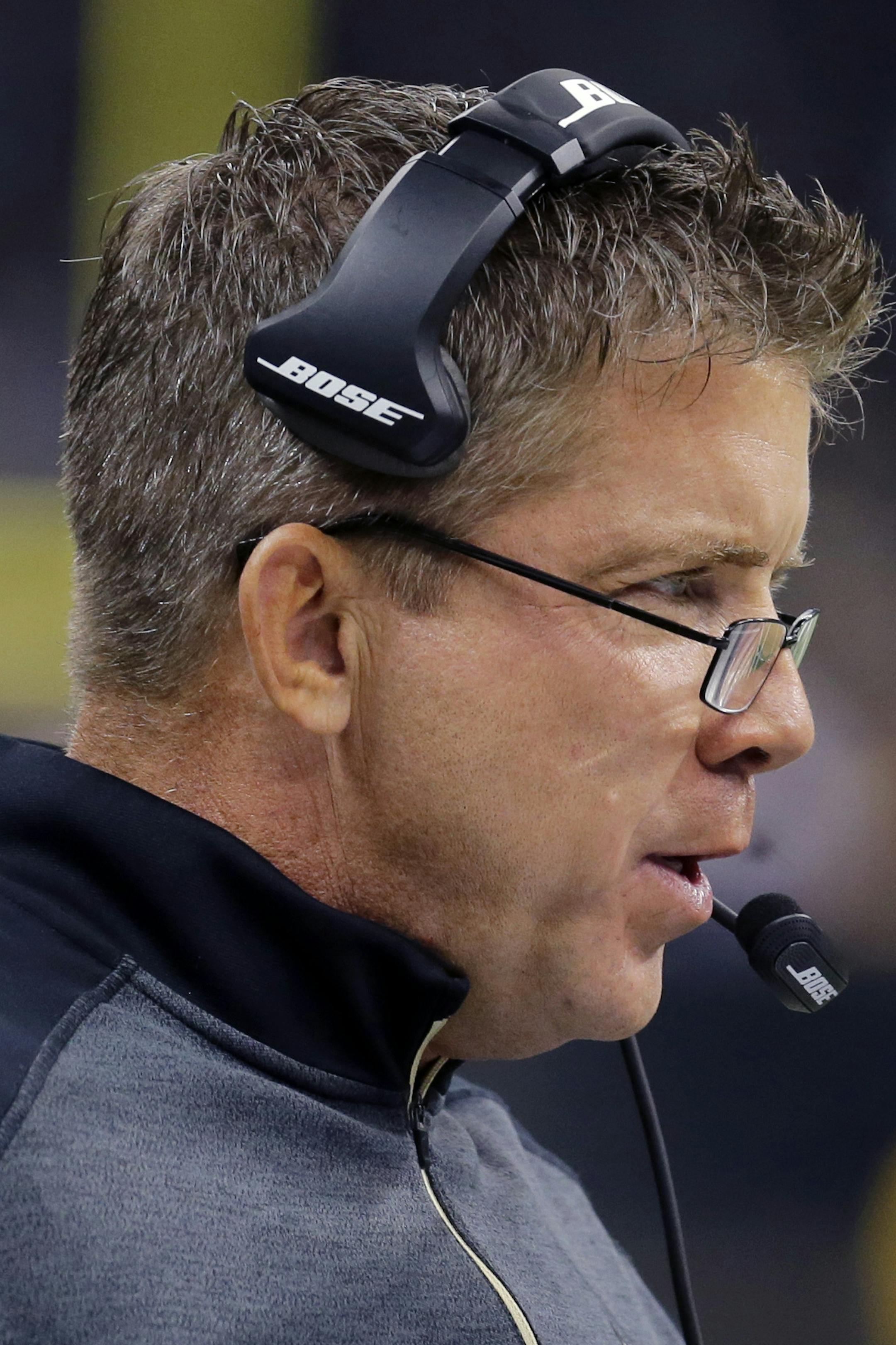 New Orleans Saints head coach Sean Payton works the sidelines in the first half of an NFL football game against the Minnesota Vikings in New Orleans, Sunday, Sept. 21, 2014. (AP Photo/Bill Haber)