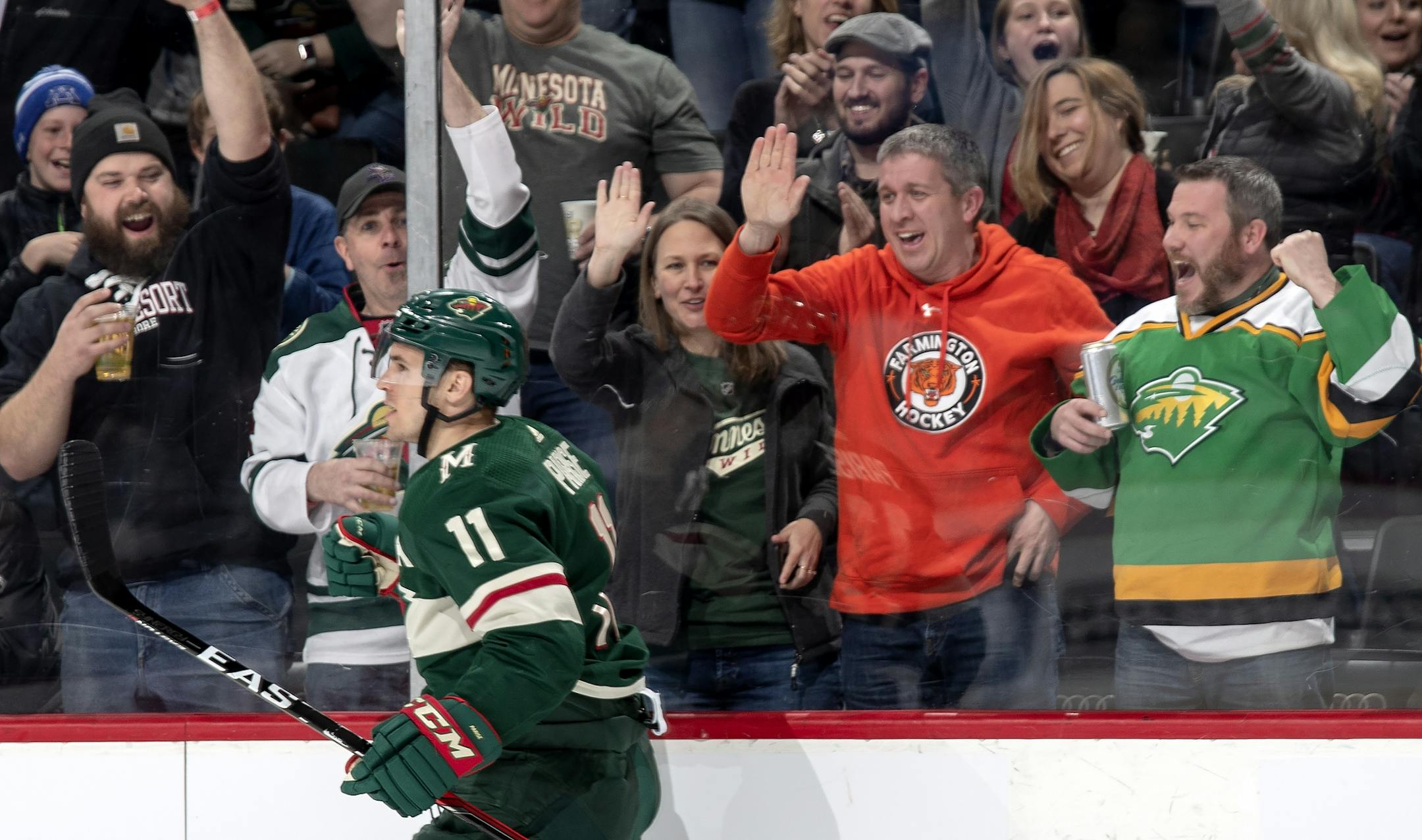 Fans celebrated after Zach Parise scored his second goal of the first period.
