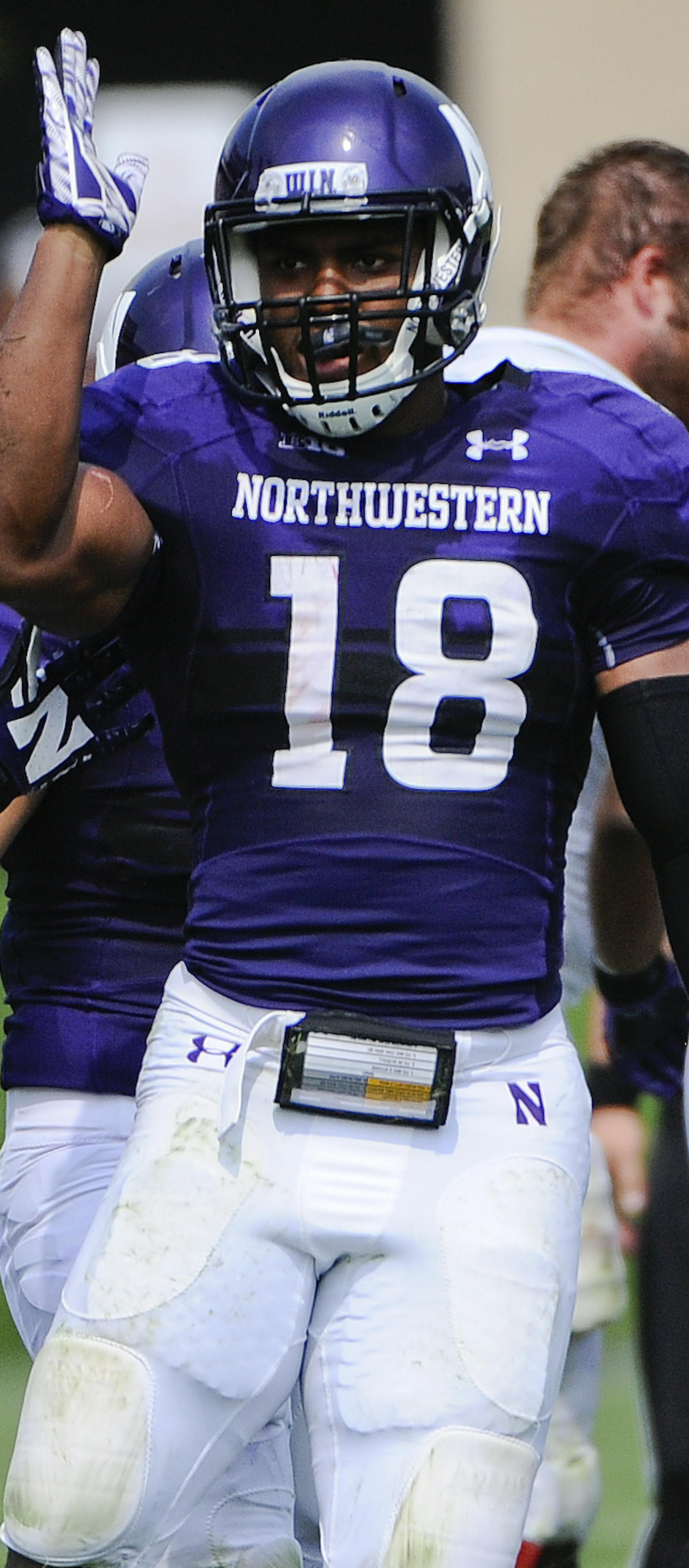 Northwestern linebacker Anthony Walker (18) and Northwestern cornerback Matthew Harris (27) during an NCAA college football against Stanford in Evanston, Ill, Saturday, Sept. 5, 2015. (AP Photo/Matt Marton ORG XMIT: OTKMM101