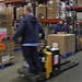 Material handlers work in the warehouse at Second Harvest Heartland, which receives donations from grocery stores such as Lunds & Byerlys, Cub Foods a