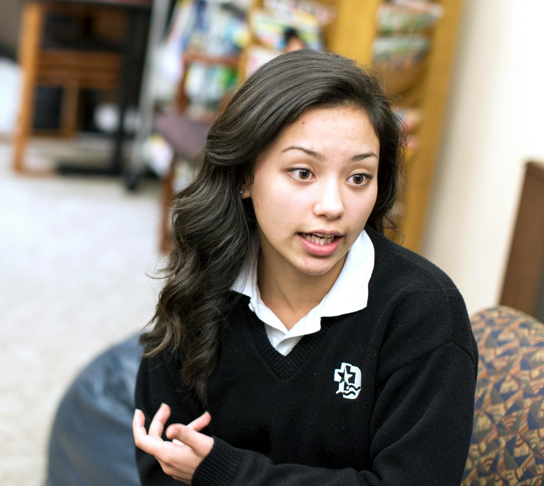 Saint Paul Youth Commission member Franceska Moua, 16, speaks about the commission's goals this year at George Latimer Central Library in Saint Paul. Photo by Courtney Perry