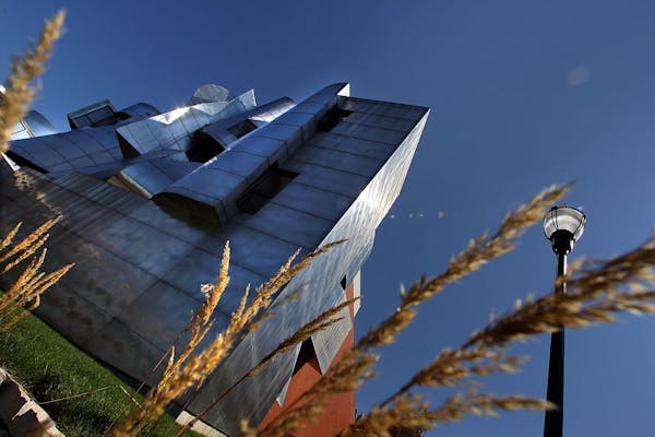 The landmark Frederick R. Weisman Art Museum, with brick and stainless steel facade,over looks the University of Minnesota campus and the Mississippi 