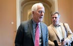 FILE - Sen. John Cornyn, R-Texas, speaks to reporters, Feb. 28, 2024, shortly before Senate Minority Leader Mitch McConnell of Ky., announced he will 