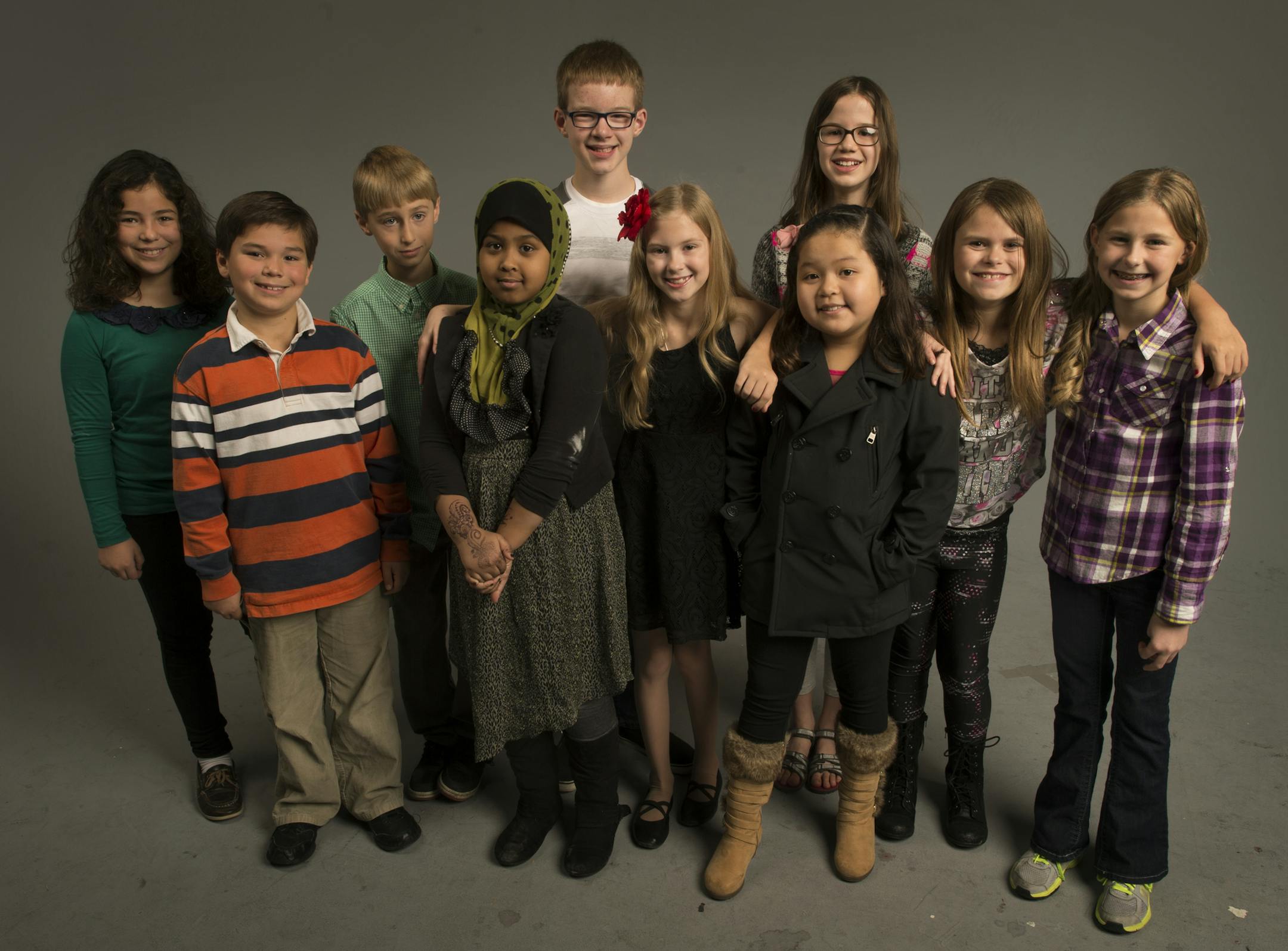 (L. to R.) Maryeva Gozalez, Marcos Odegard, Willen Nelsen, Suhuur Dualeh, William Rosin, Sophia Anderson, Samantha Lee (front), Lauren Downham (back), Callidora Muonio, and Jaiden Williams. ] Annual must - do shots of the United Way essay contest winners - approx 10 kids 000000 UnitedWay_102614 20036986A (DAVID BREWSTER/STAR TRIBUNE)