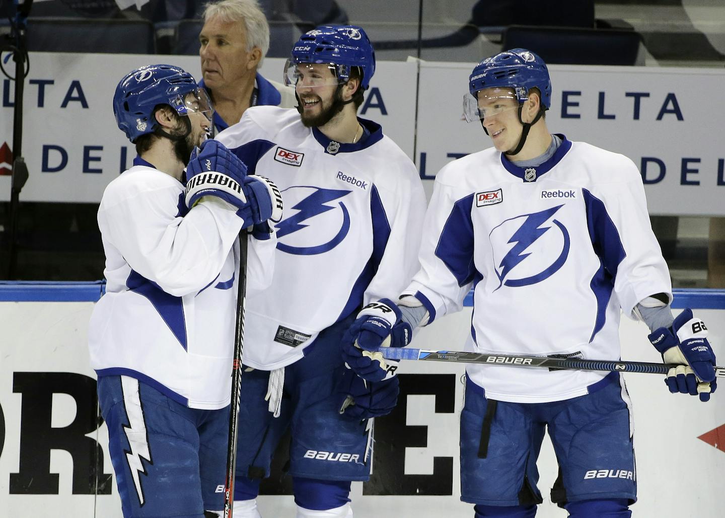 Tampa Bay Lightning players, from left, Tyler Johnson, Nikita Kucherov, and Ondrej Palat during practice for the NHL hockey's Stanley Cup finals Tuesday, June 2, 2015, in Tampa, Fla. The Lightning will take on the Chicago Blackhawks beginning on Wednesday night. (AP Photo/Chris O'Meara)