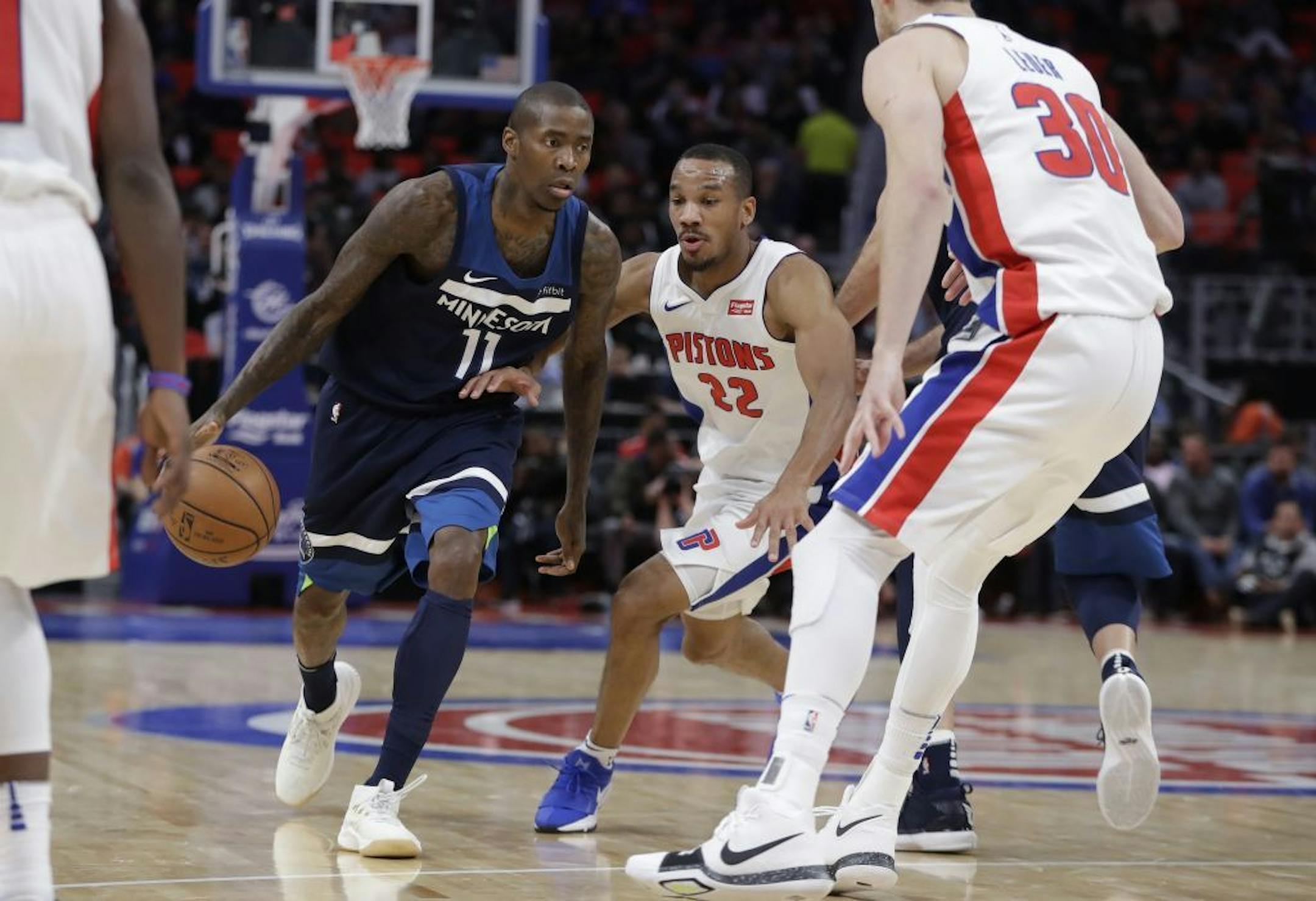 Minnesota Timberwolves guard Jamal Crawford (11) dribbles around Detroit Pistons guard Avery Bradley (22) during the second half of an NBA basketball game, Wednesday, Oct. 25,2017, in Detroit.