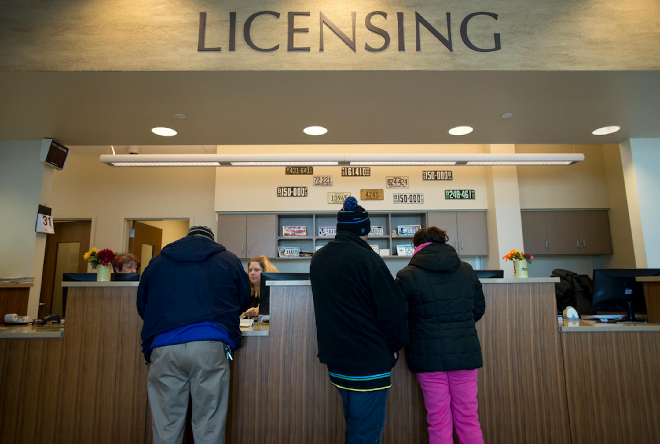 Residents filled out licensing requests at the Richfield City Hall on in January 2014.