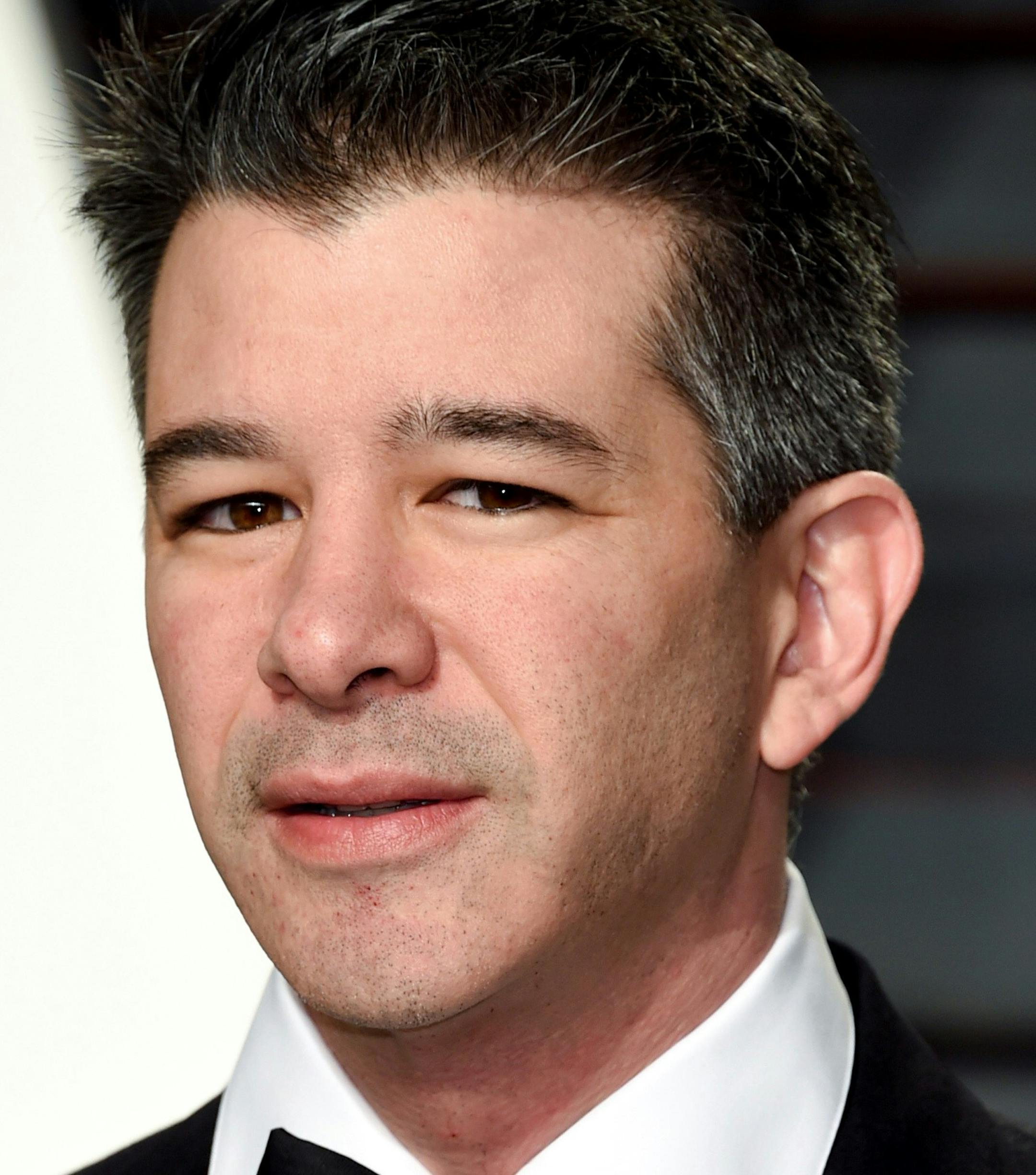 Uber CEO Travis Kalanick arrives at the Vanity Fair Oscar Party on Monday, Feb. 27, 2017, in Beverly Hills, Calif. (Photo by Evan Agostini/Invision/AP) ORG XMIT: INVW