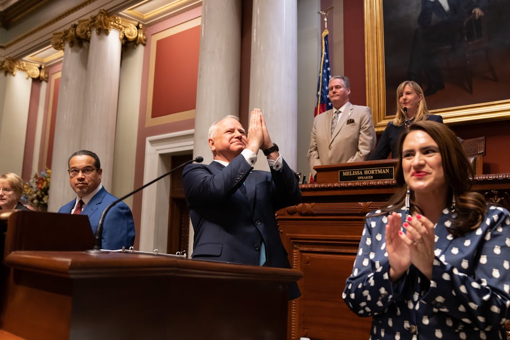 Walz delivered his State of the State address in January 2021 surrounded by legislators and Lt. Gov. Peggy Flanagan, right, and Attorney General Keith Ellison, left.