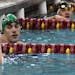 Peter Larson of Edina shook hands with Daniel Larson of Irondale, New Brighton after competing in the 50 yard freestyle.