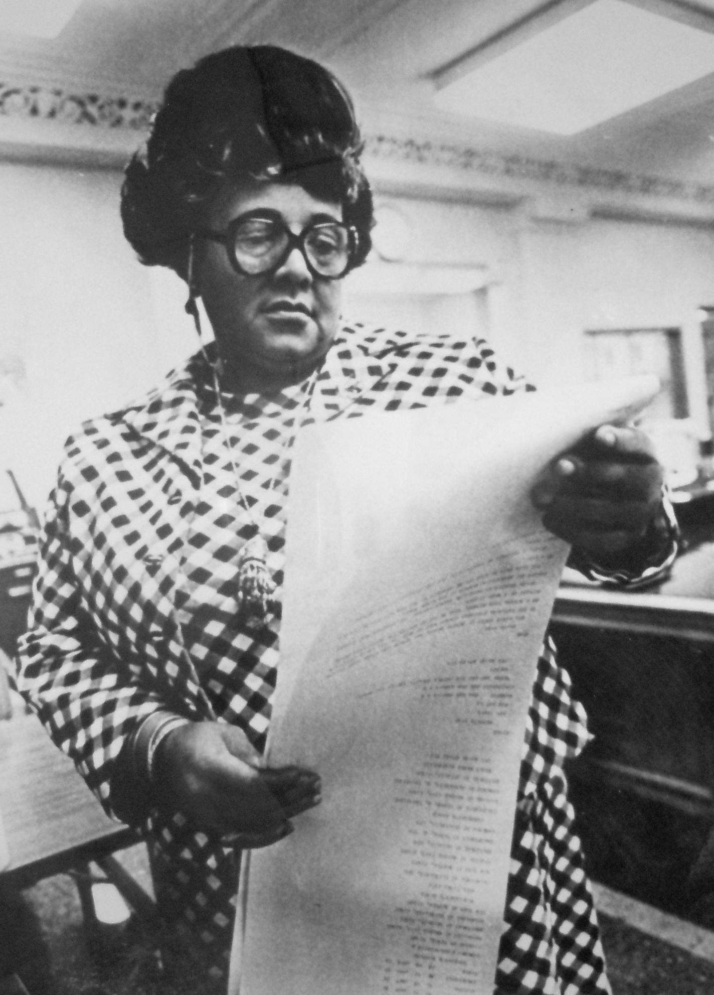 Ethel, Payne checking wire copy (Courtesy of the Library of Congress)