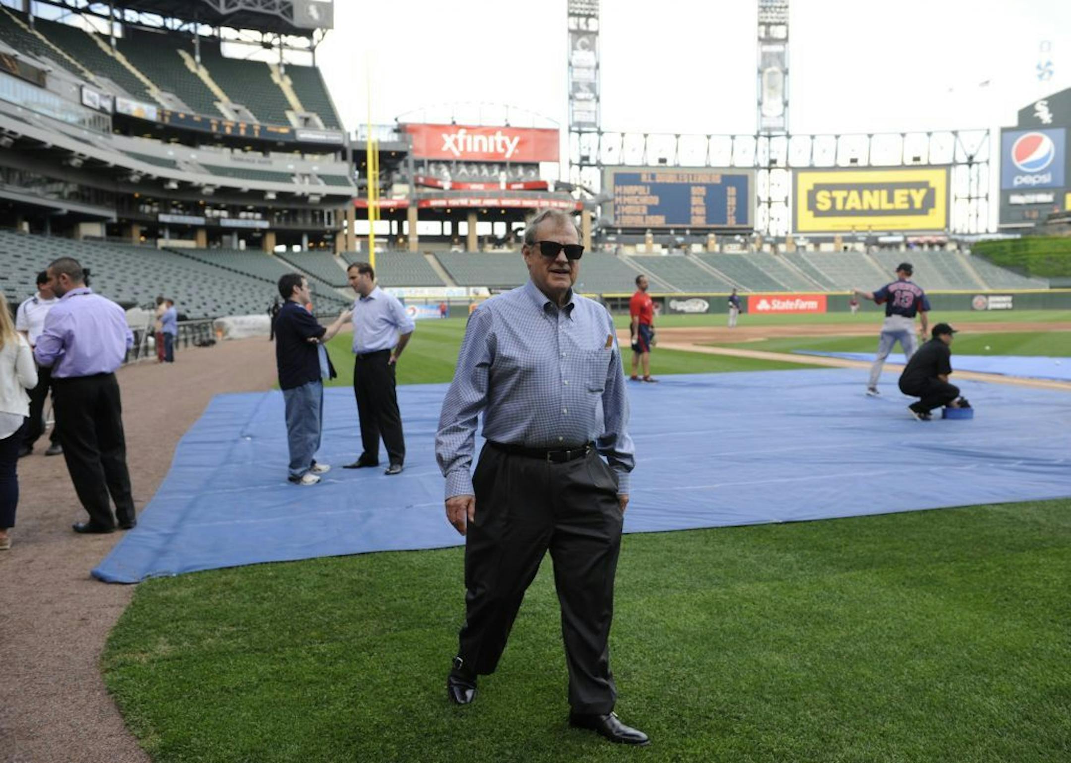Jerry Reinsdorf chairman of the Chicago White Sox walks on the field during batting practice before the game between the Chicago White Sox and the Boston Red Sox baseball game,Tuesday, May 21, 2013 in Chicago.