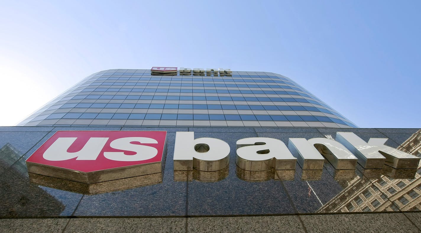 Signage is displayed on the exterior of the U.S. Bank building in Salt Lake City, Utah, U.S., on Monday, July 13, 2009. U.S. Bancorp, parent company of U.S. Bank, will report second quarter results on July 22. Photographer: George Frey/Bloomberg ORG XMIT: MIN1407161740221626