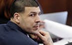 Aaron Hernandez listened during his double murder trial in Suffolk Superior Court in Boston in March 2017.