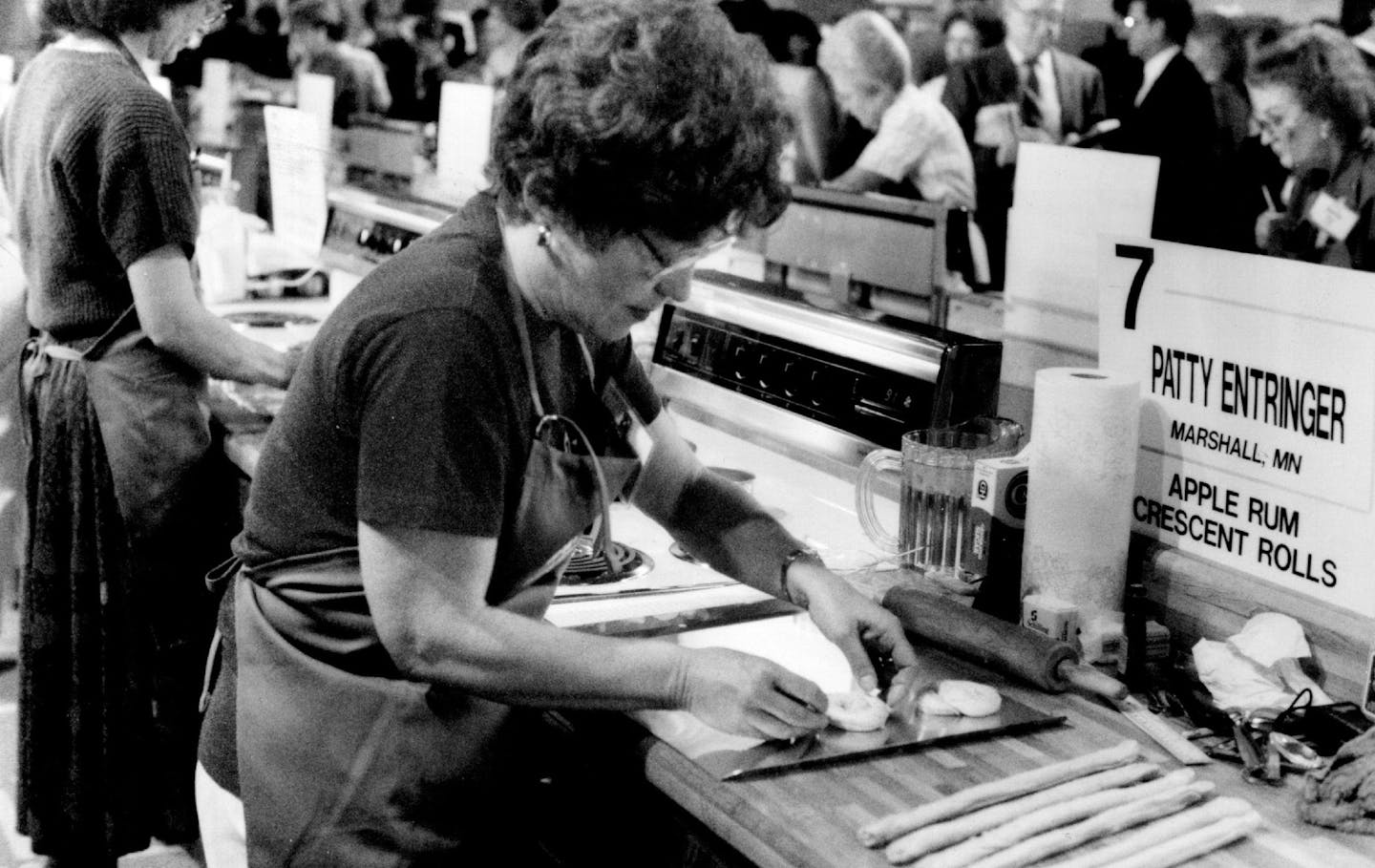 Patty Entringer of Marshall, Minn., prepared her Apple Rum Crescent Rolls entry in the 1988 Pillsbury Bake-Off.