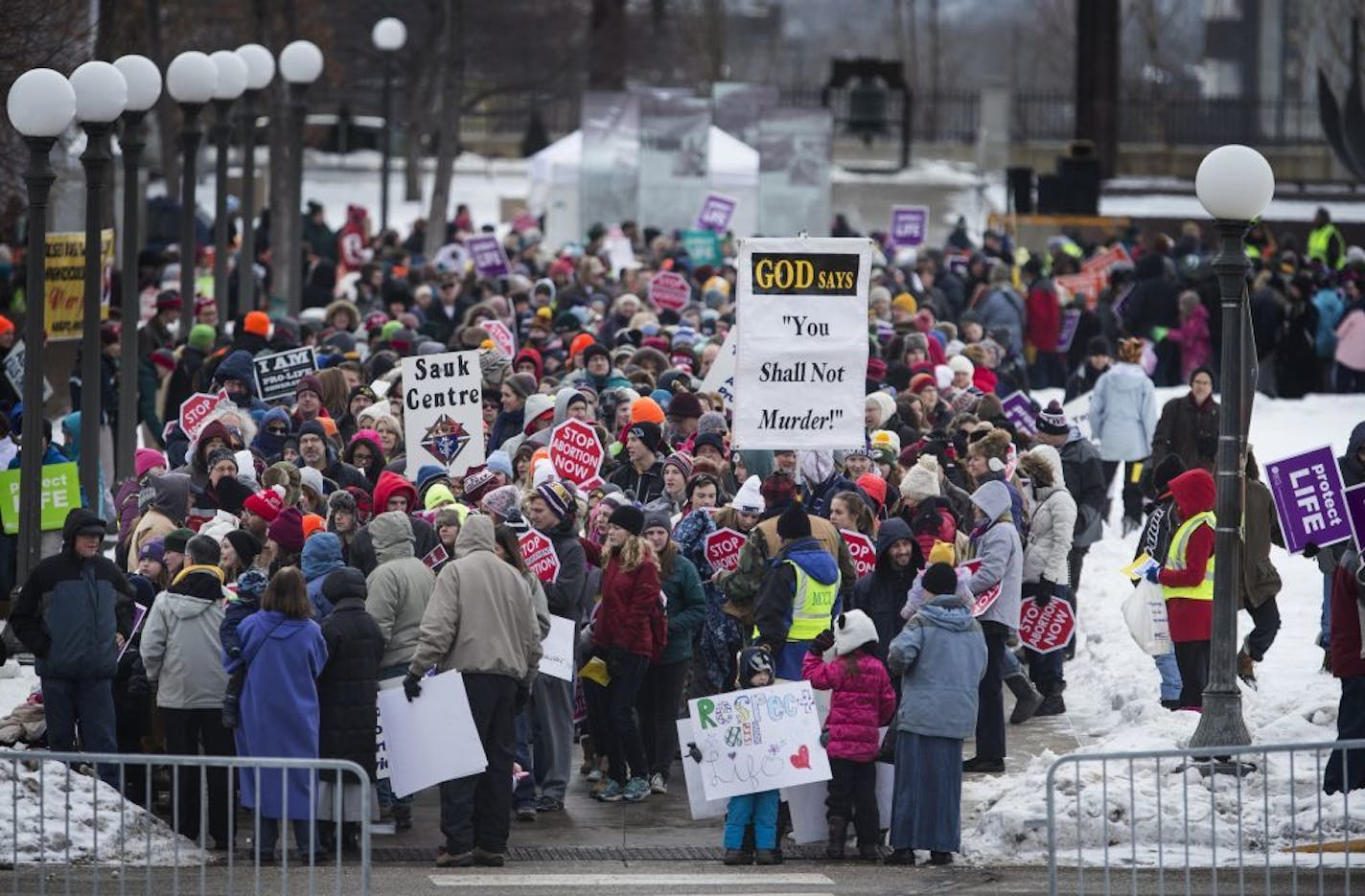 People rally and march during the annual Minnesota Citizens Concerned for Life March for Life at the State Capitol Mall in St. Paul on Friday, January 22, 2016.