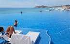 The infinity pool, complete with swim up bar. (Samantha Feuss/TNS)