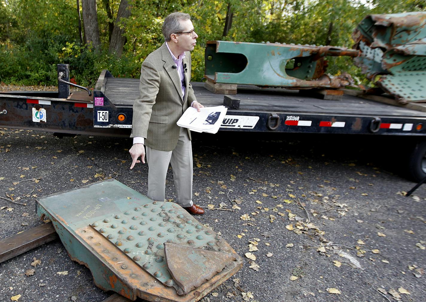 Before storing the piece, Adam Scher the Senior Curator at the Minnesota Historical Society showed the piece that was responsible for the I-35W bridge collapse at the Society's Warehouse, Thursday, October 17, 2013 in St. Paul, MN. (ELIZABETH FLORES/STAR TRIBUNE) ELIZABETH FLORES &#x2022; eflores@startribune.com