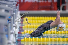 Victoria Beelner competes in the women’s 50-meter backstroke.