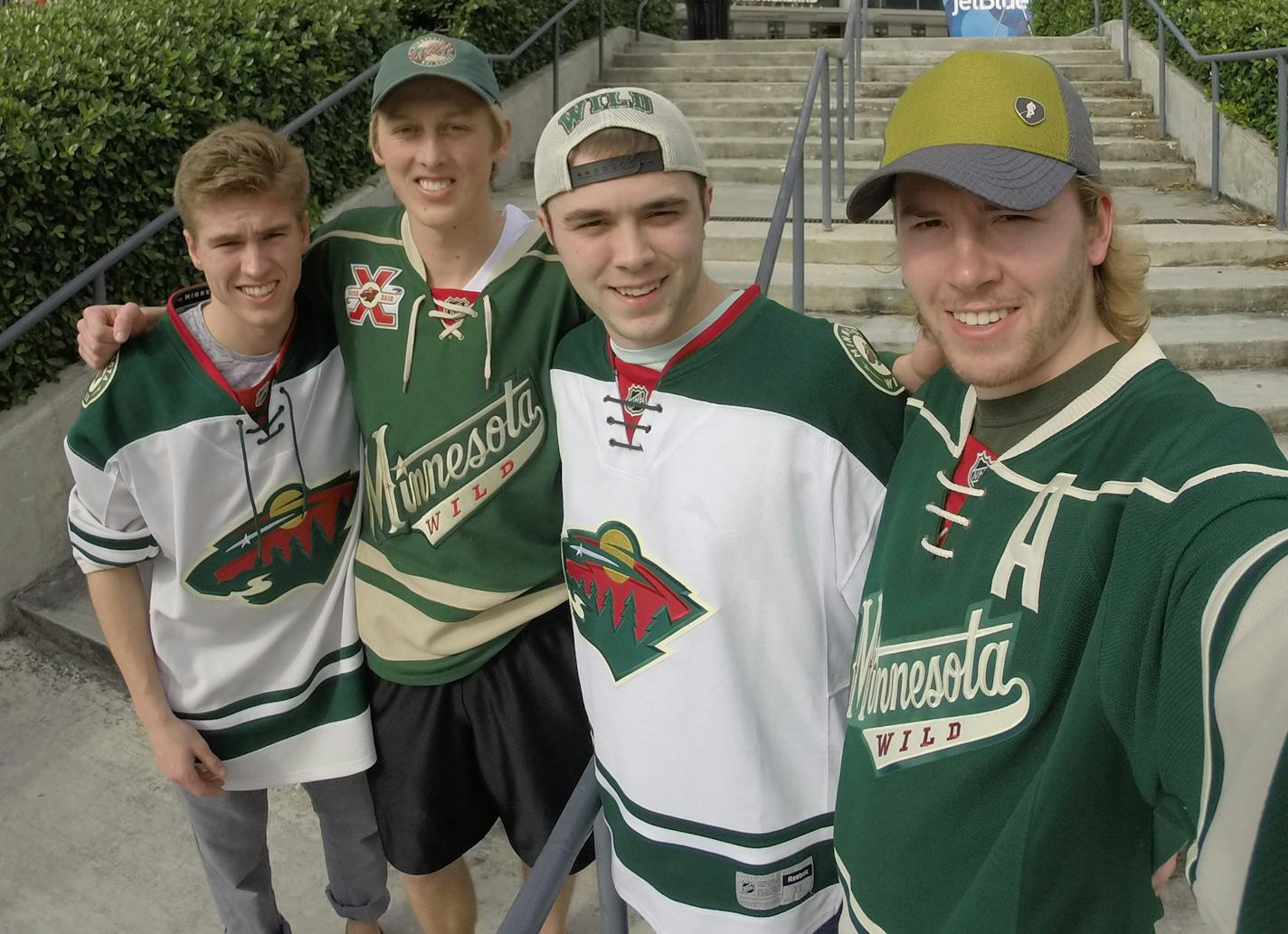 Wild road-trippers, from left, Zach Holloway, Brooks Nelson, Kayle Hanson and Cole Grandgenett get a selfie in front of the BB&T Center in Sunrise, Fla.