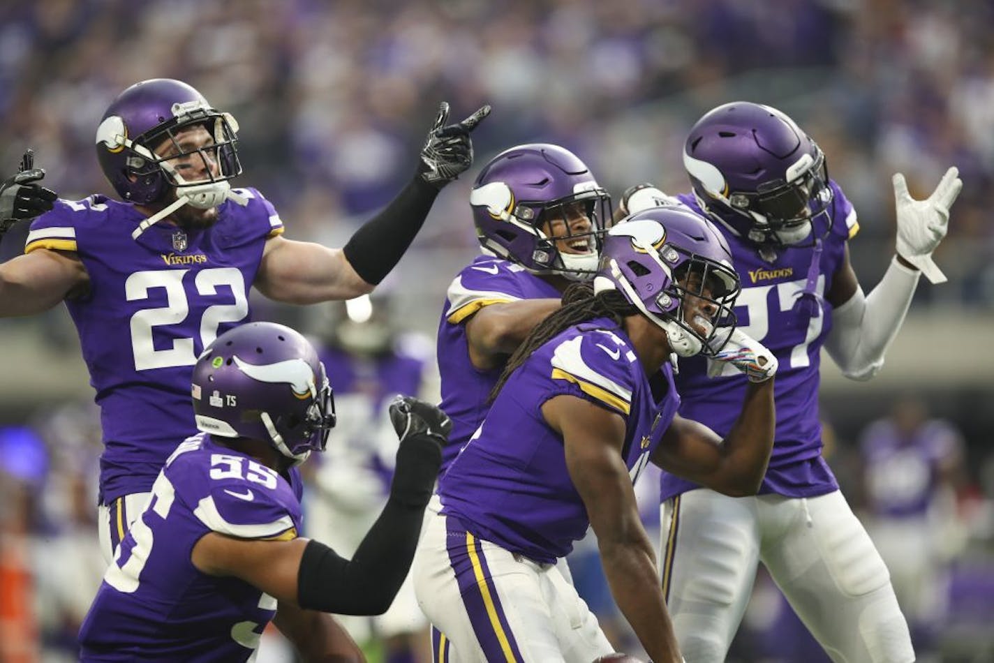 Minnesota Vikings teammates celebrated with defensive back Anthony Harris (41) after he intercepted a third quarter pass intended for Arizona Cardinals wide receiver Larry Fitzgerald.